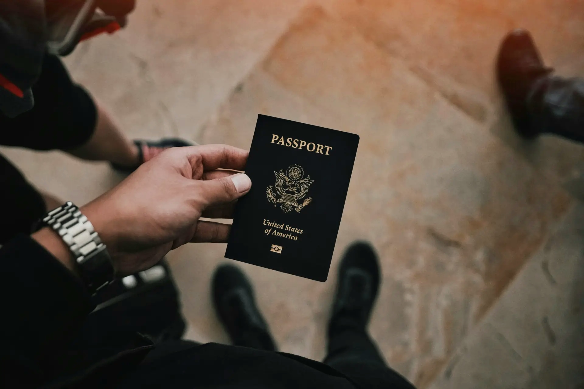 person holding US passport