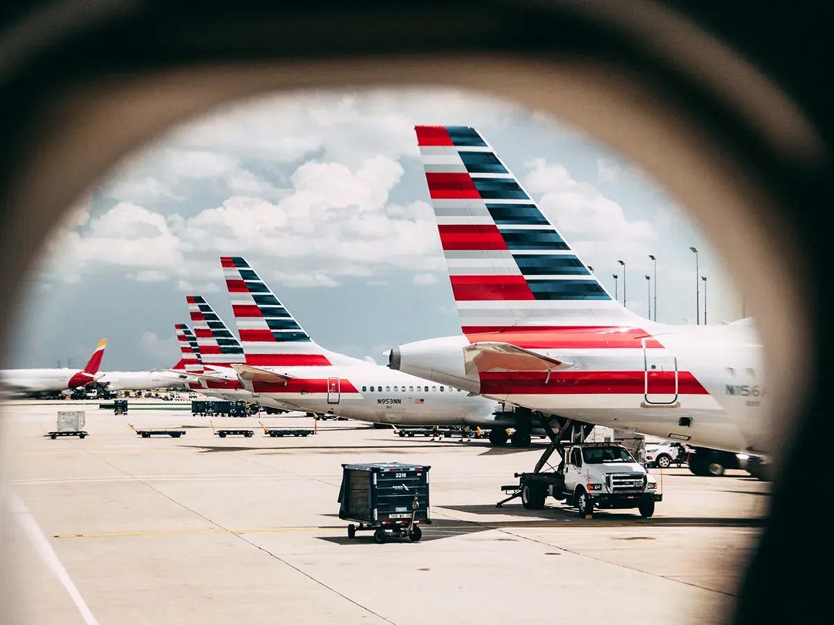 A photograph of American Airlines planes at an airport
