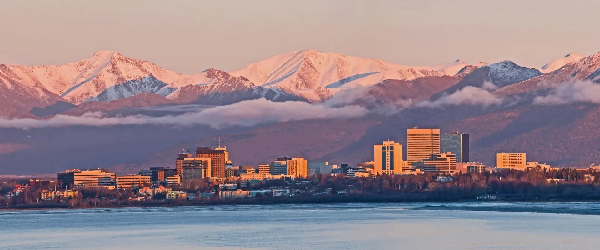 Anchorage skyline with mountains in the background