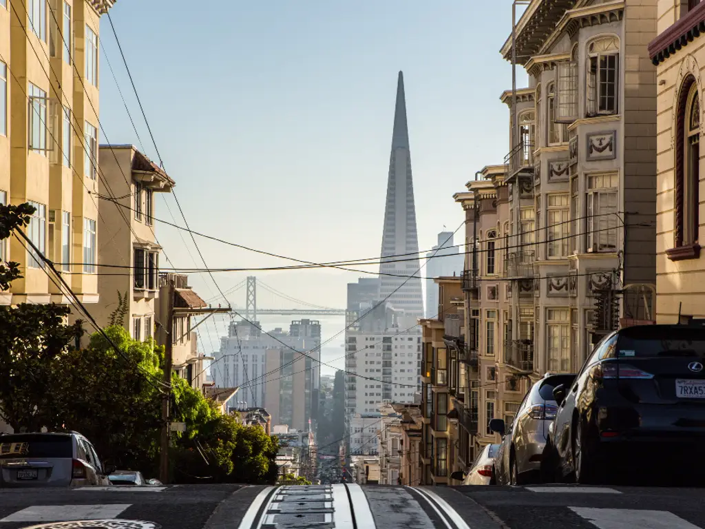 Street with cable car tracks facing the Bay Bridge in San Francisco