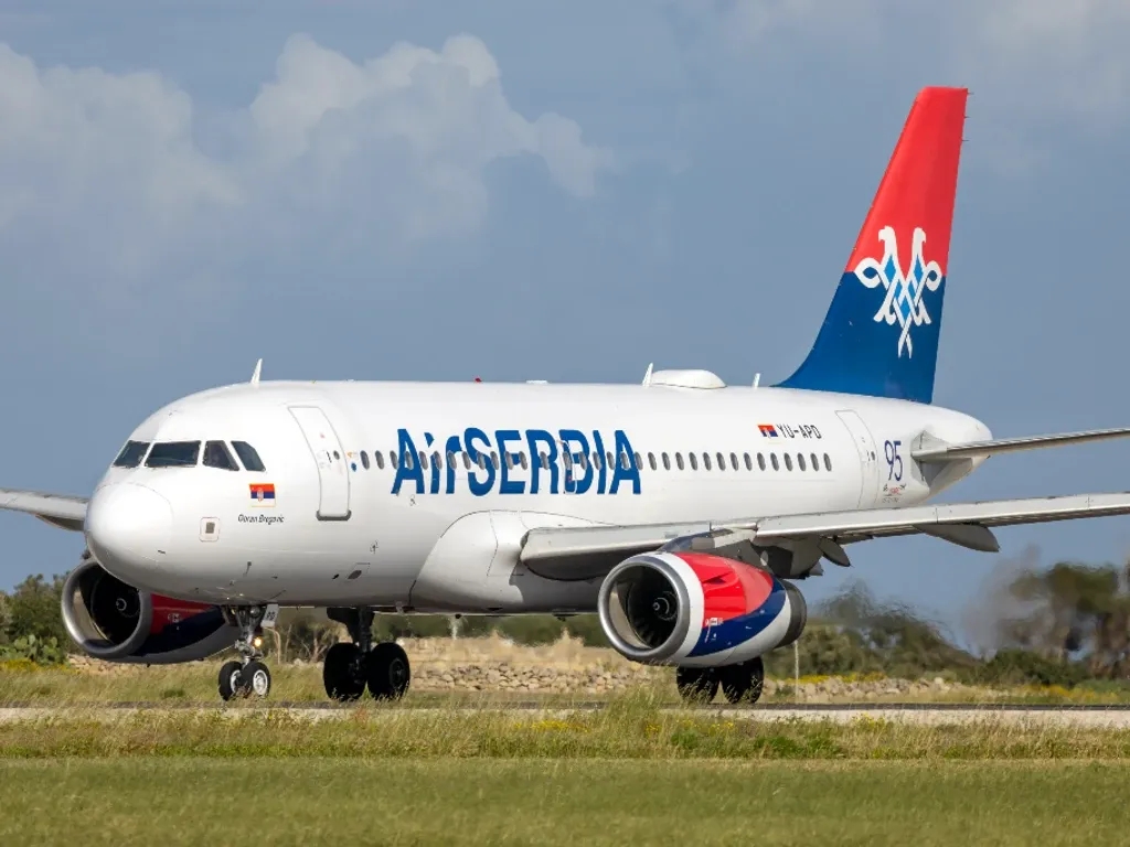 An Air Serbia plane sits on the tarmac