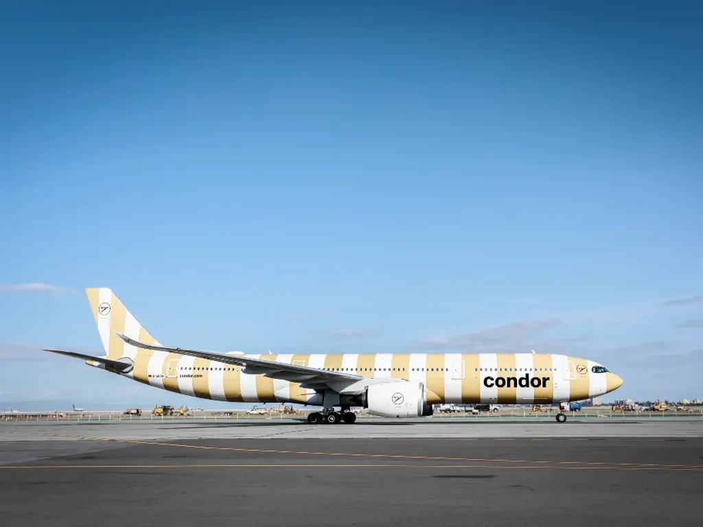 A Condor plane sits on the tarmac at the airport