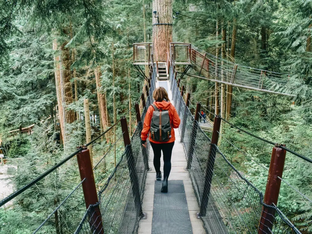 person walking on a sky canopy near Vancouver, CA