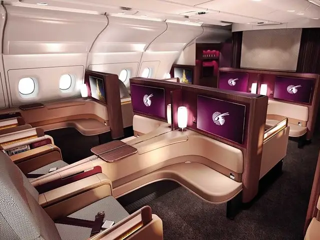 Qatar Airways plane flying.