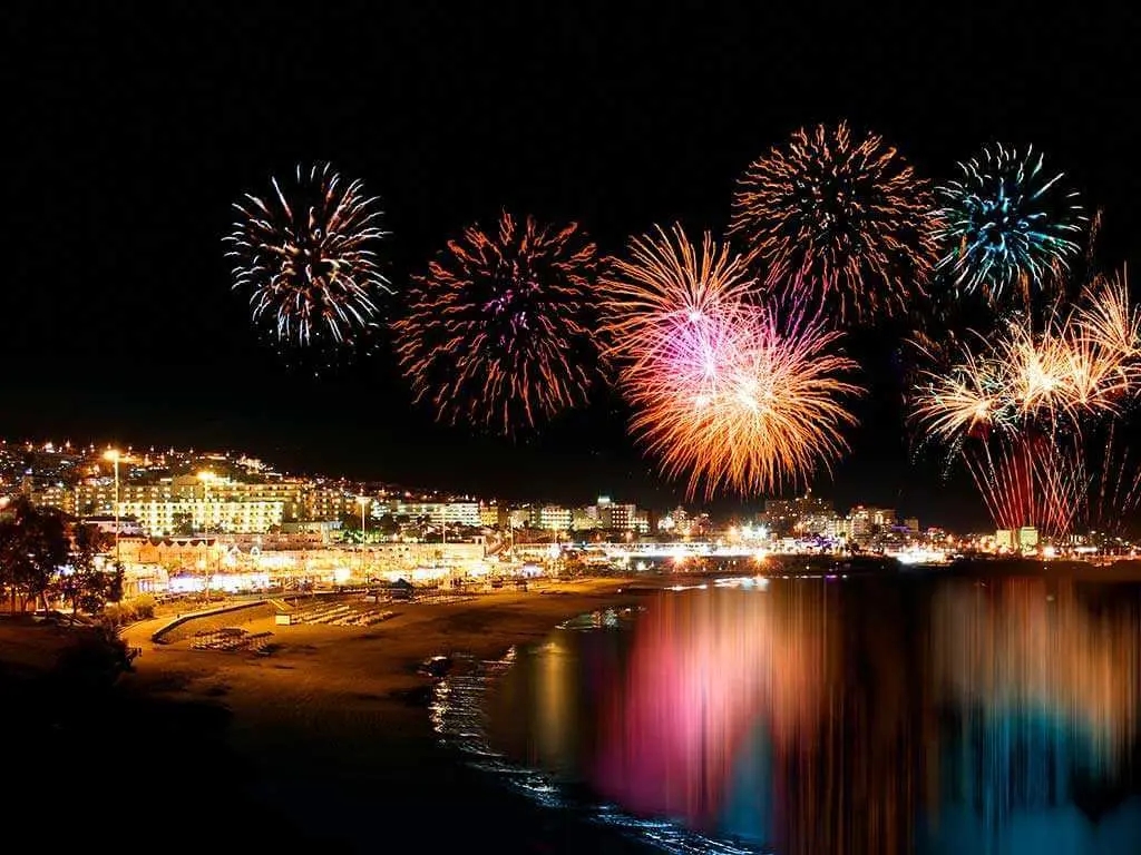 Beach with fireworks celebrating New Year's