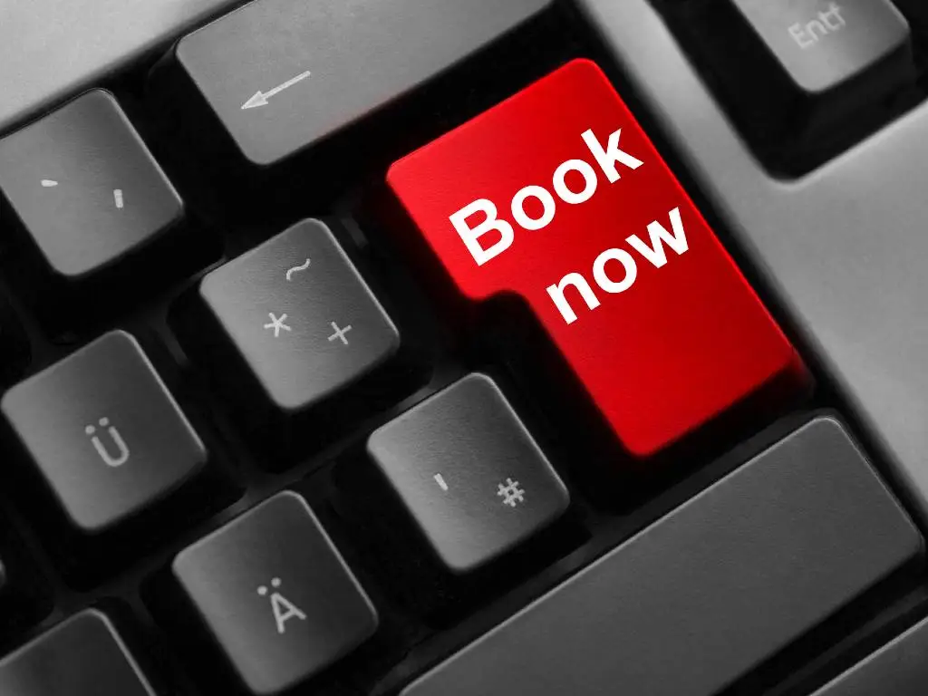 red "book now" button on keyboard.