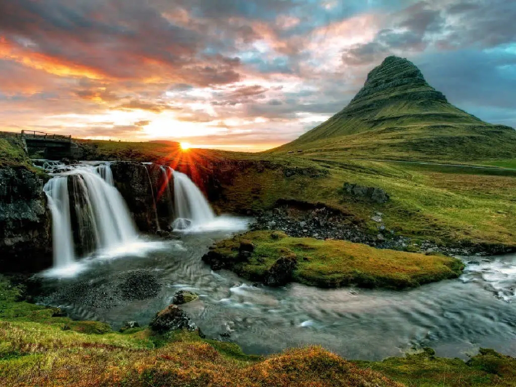 mountain and waterfall in Iceland.