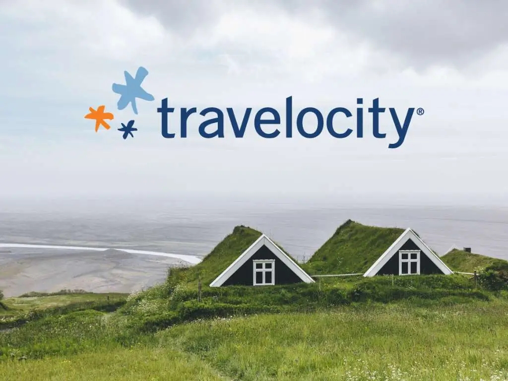 Icelandic turf houses with Travelocity flights logo