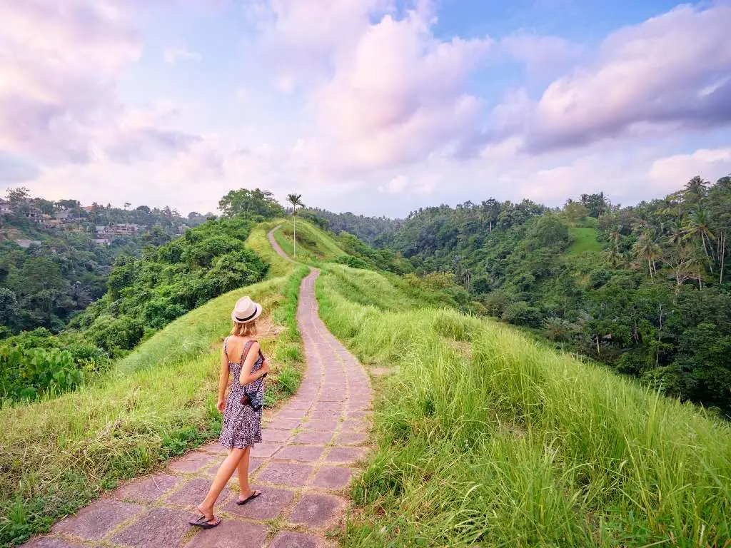 woman walking on path in Sri Lanka.