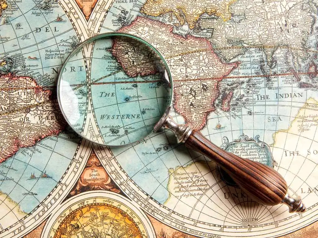magnifying glass over world map