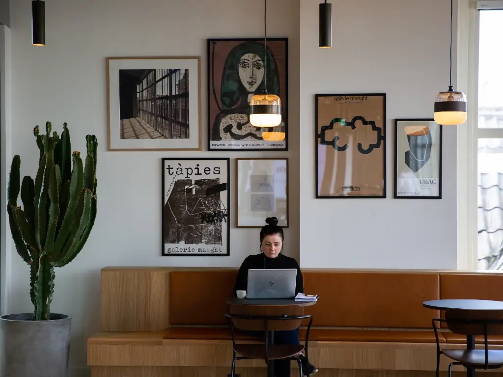 small business owner working from a coffee shop 