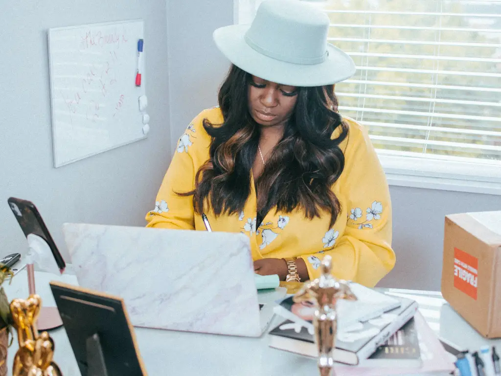 small business owner working at laptop