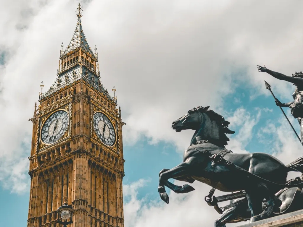 Big Ben and a horse statue in London