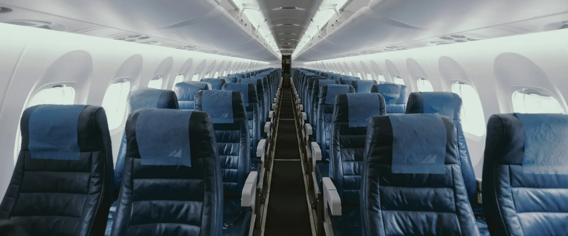 Looking at the plane seats down the aisle