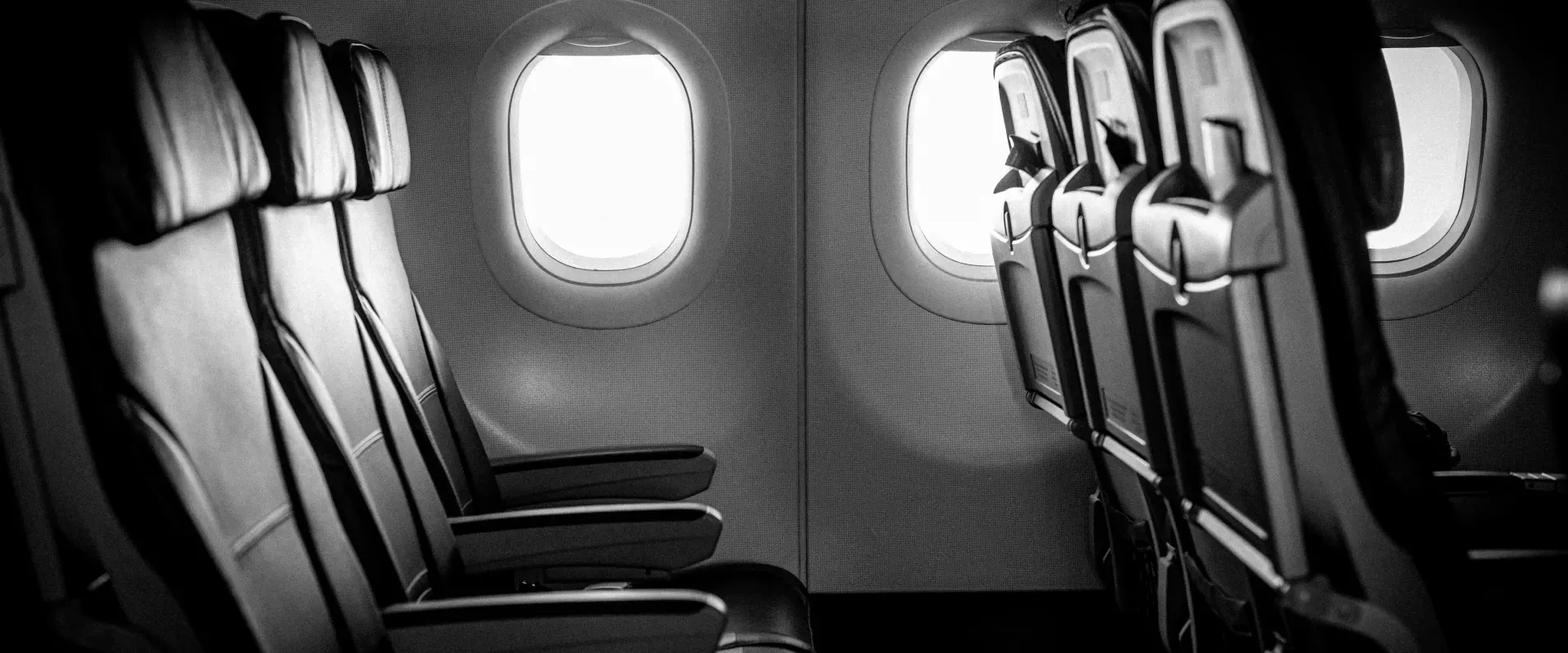 rows of seats on a plane