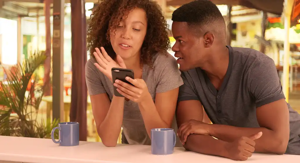couple looking at phone